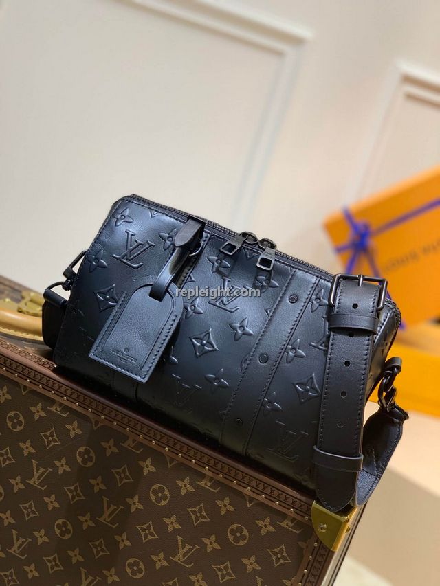 LOUIS VUITTON-M57955 루이비통 블랙 모노그램 씰 시티 키폴